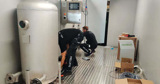 Technicians installing ozone systems
